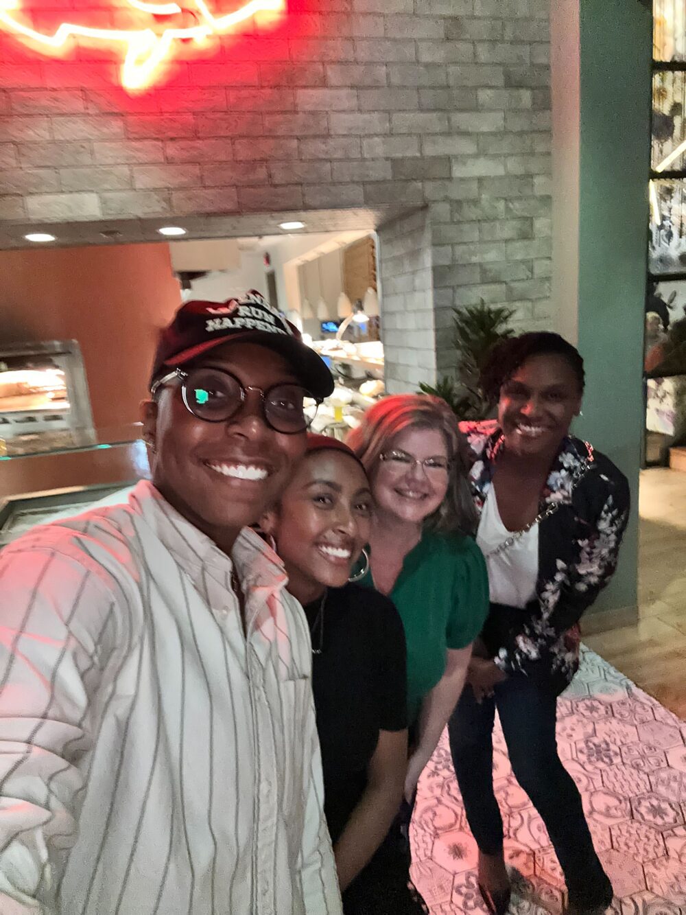 Arena members smiling for a selfie